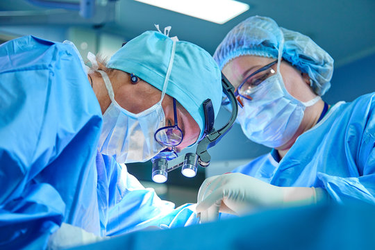 Surgeons in operating room